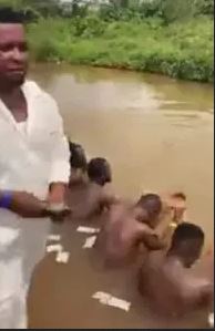Shocking Video Of Prophet Performing Money Ritual For Yahoo Boys In A River