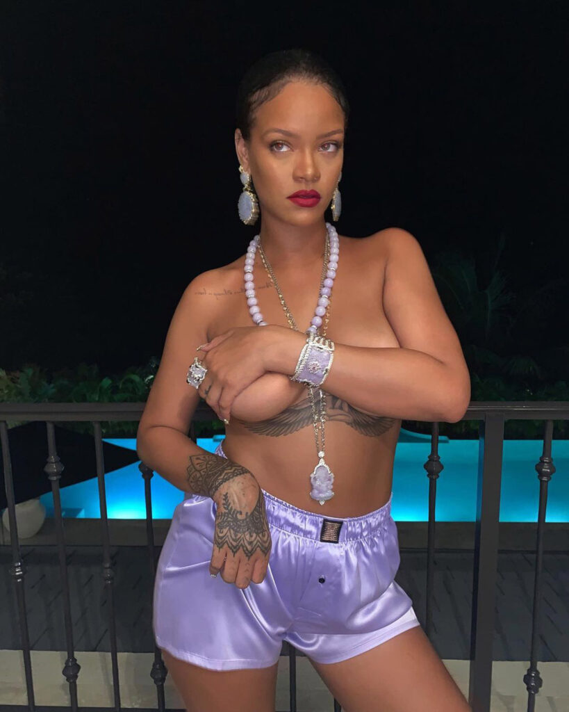 Rihanna goes topless in new sexy poolside snap