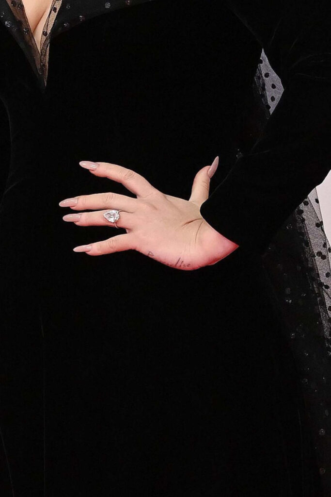 Adele sparks engagement talks with diamond ring at Brit Awards 2022