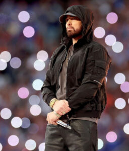 Eminem takes a knee at superbowl halftime after performing (Photos)