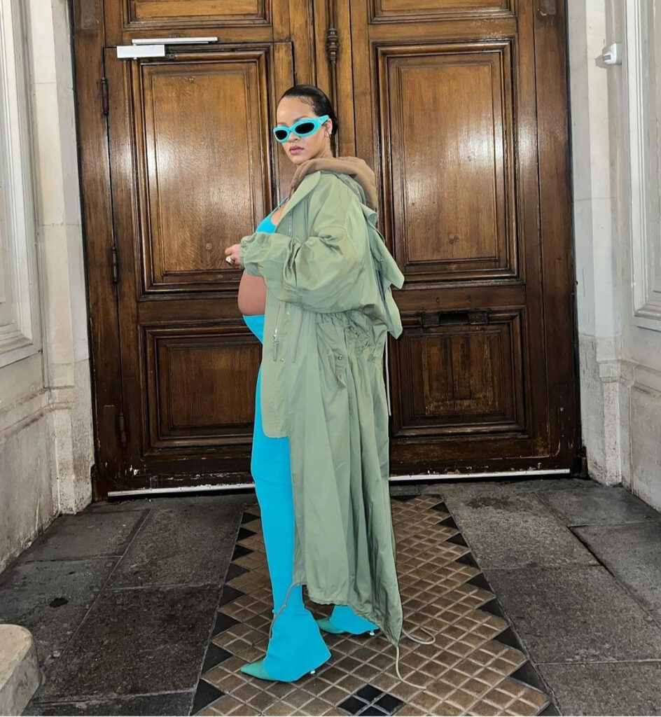Rihanna steps out in a blue cut-out jumpsuit showing off her bump at Paris Fashion Week (photos)