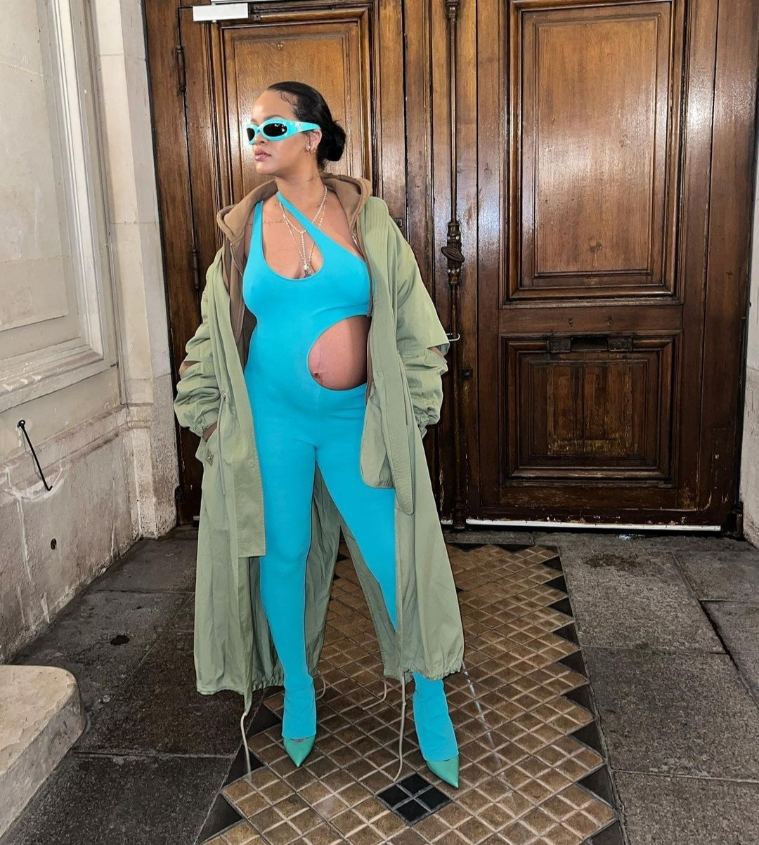 Rihanna steps out in a blue cut-out jumpsuit showing off her bump at Paris Fashion Week (photos)