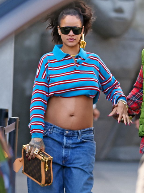 Rihanna displays baby bump in crop top as she goes for a stroll with A$AP Rocky